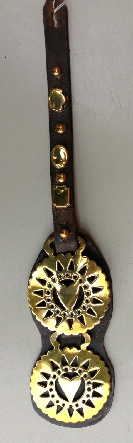 Antique Horse Brasses on decorated Strap