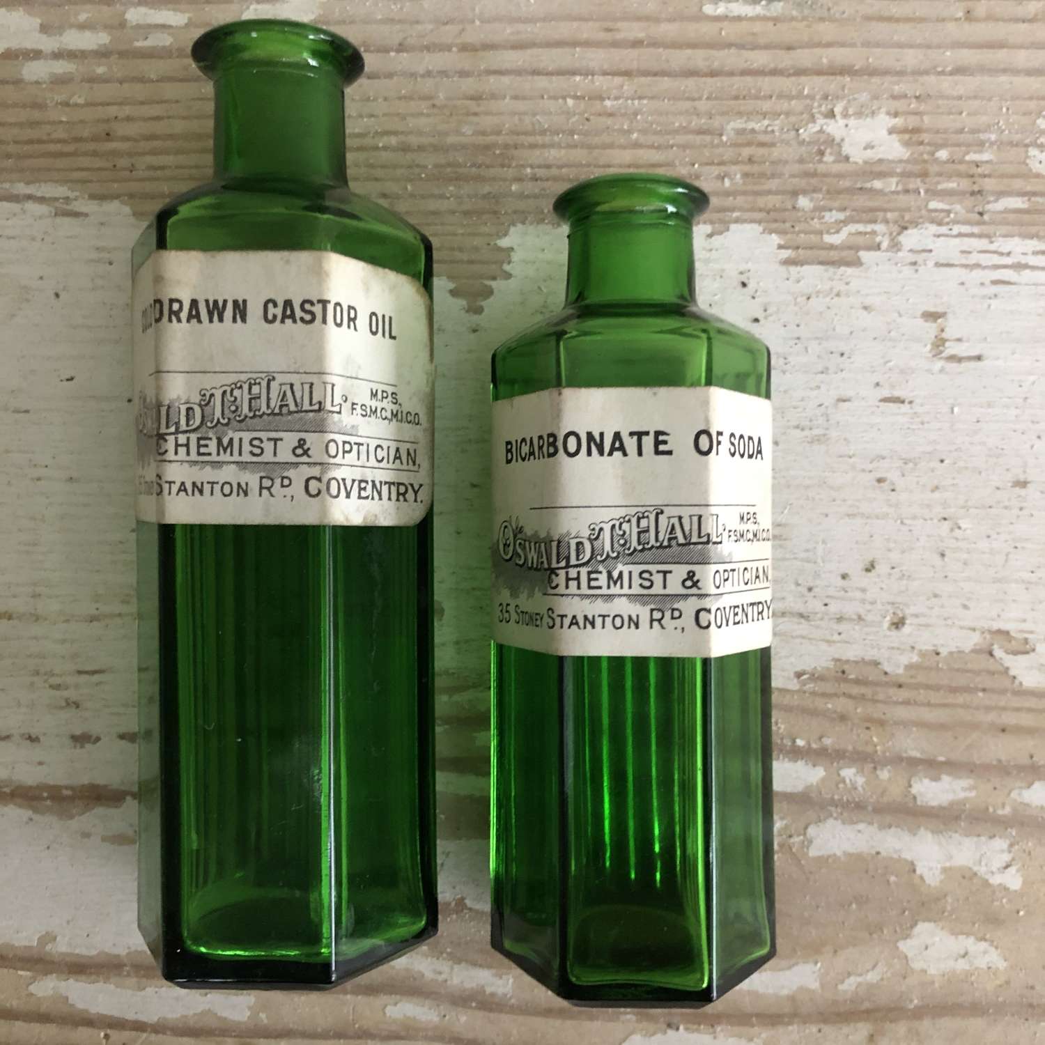 Pair of Green chemist Bottles