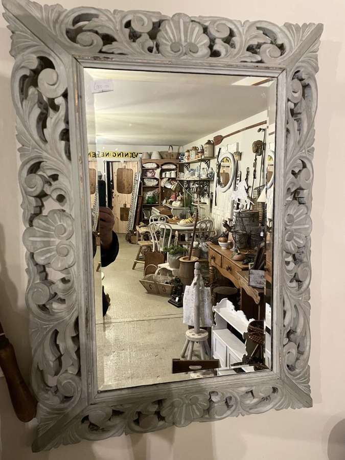 Deeply carved Mirror